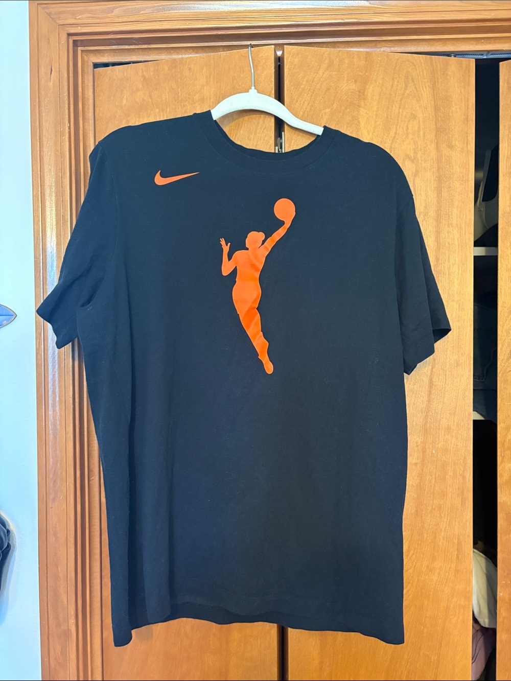 Nike WNBA Black T-Shirt with Orange Basketball Silhouette and Swoosh